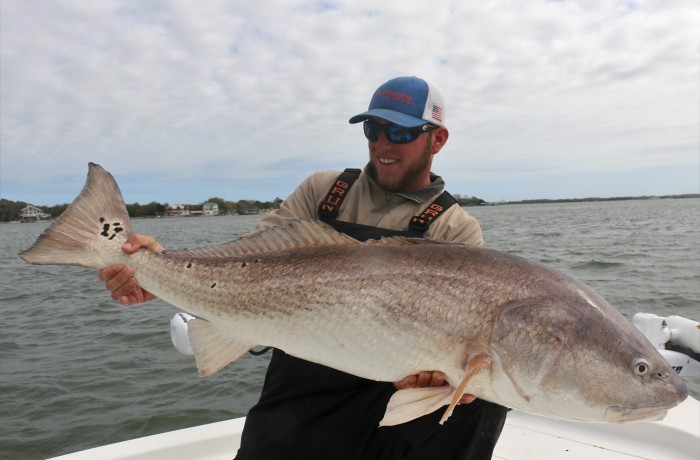 Wess Reeder with a beast of a Bull Red